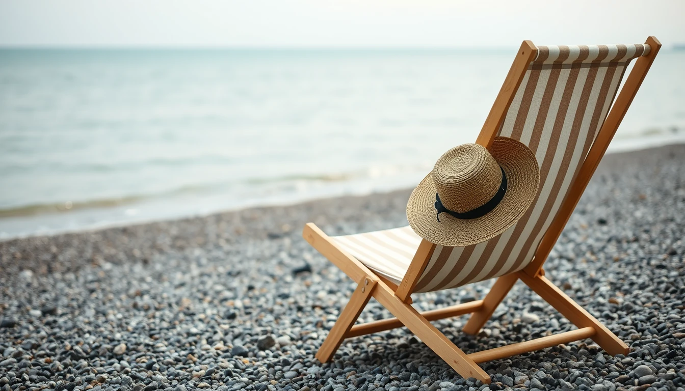 Photo of an empty striped deckchair with a straw hat on a quiet pebble beach by a calm sea, illustrating holiday pay calculation for employers